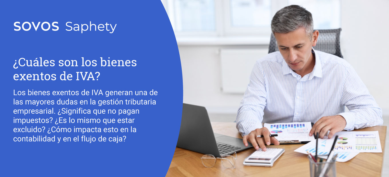 Profesional financiero utilizando calculadora y revisando reportes contables para gestión de bienes exentos de IVA en Colombia.