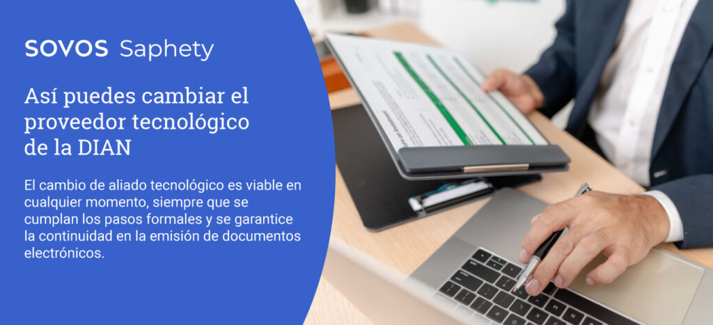 Empresario analizando gráficos financieros como parte del proceso de cambio de proveedor tecnológico ante la DIAN en Colombia.