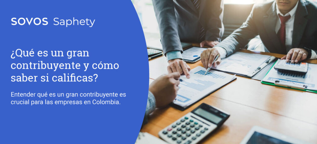 Equipo financiero de empresa analizando documentos contables y datos tributarios en oficina para cumplimiento fiscal en Colombia.