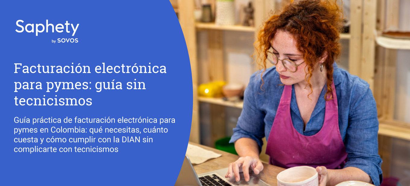 Dueña de un negocio utilizando un computador para gestionar la facturación electrónica para pymes.